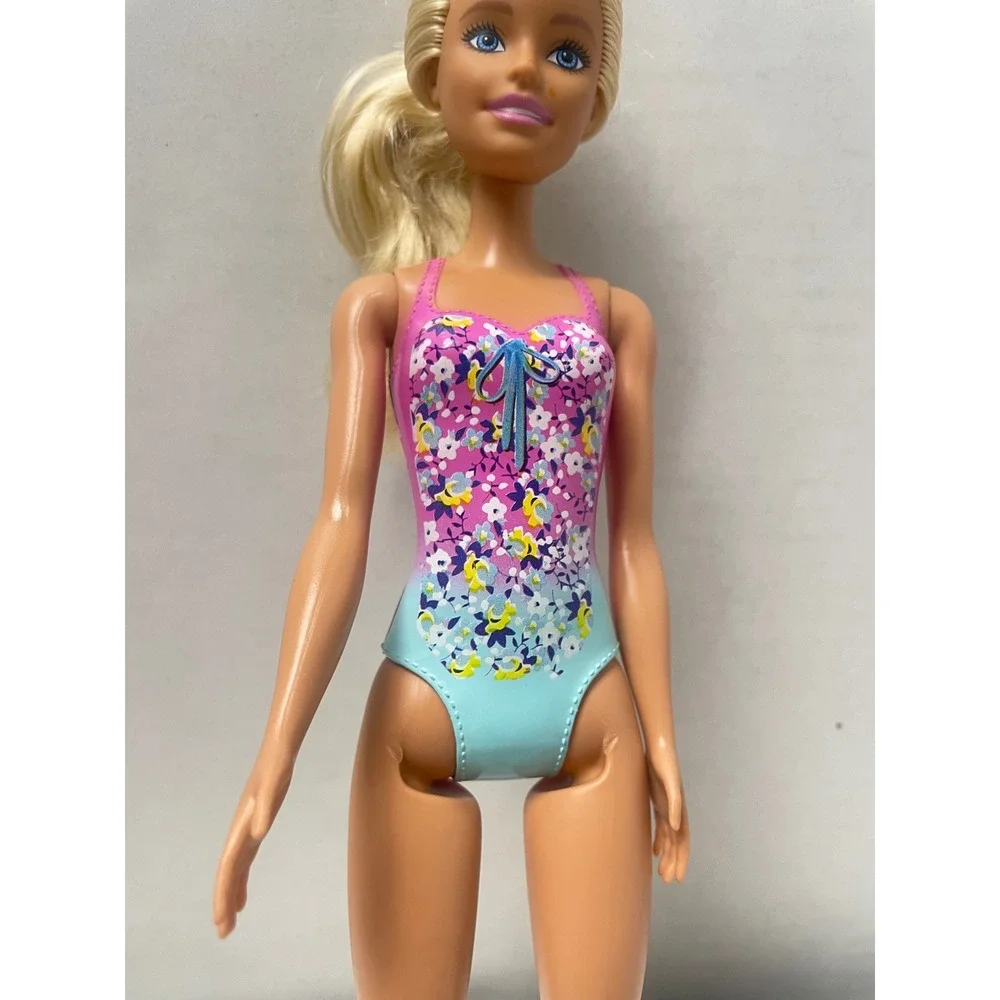 Mattel Barbie Doll 2019 Molded Pink Floral Swimsuit Blonde Hair Blue Eyes 11.5in